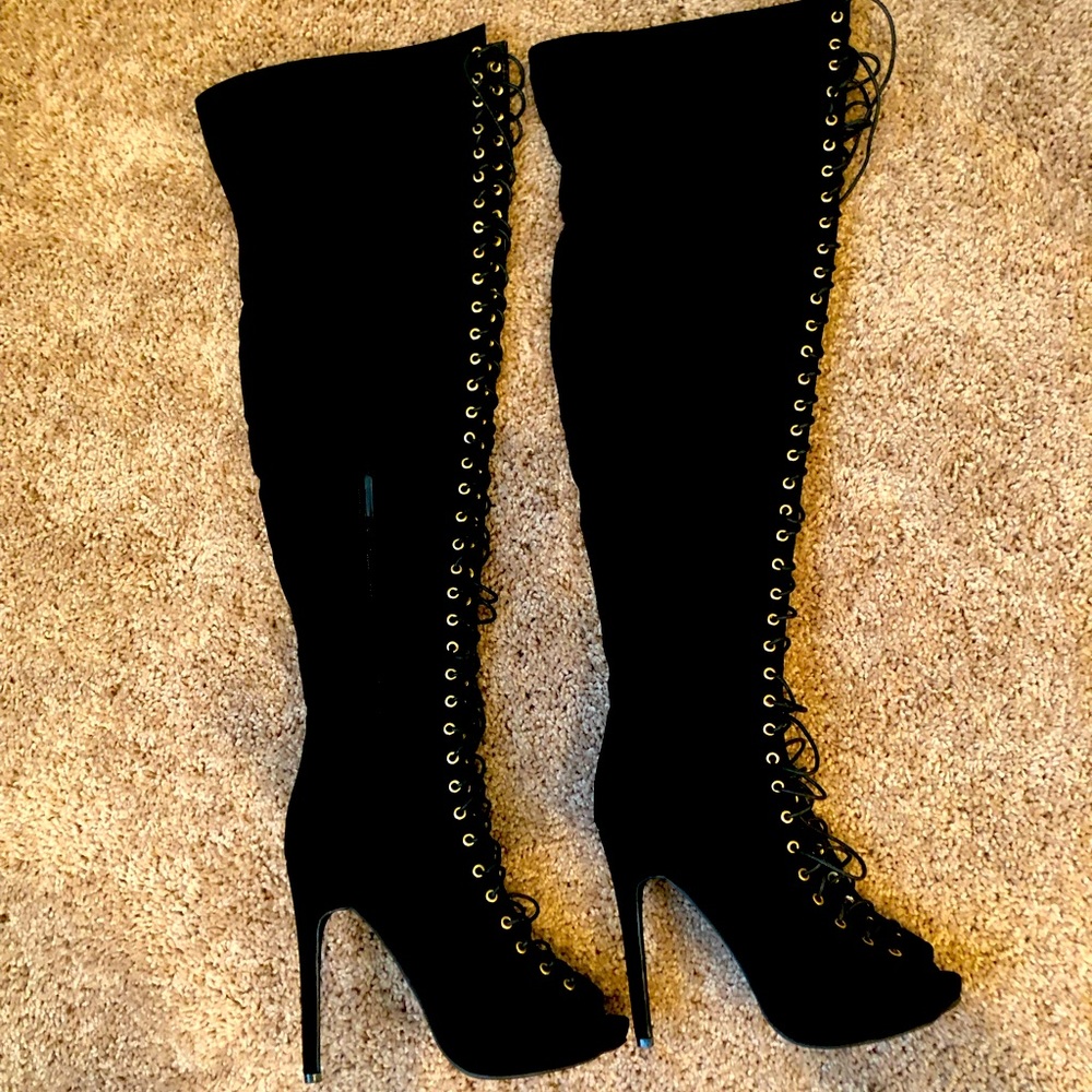 Black over the knee lace up boots with 4 inch heel size 7.5